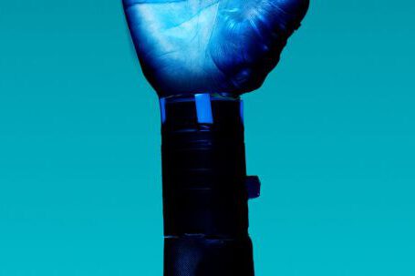 Engineering Internships - Prosthetic Arm on Blue Background